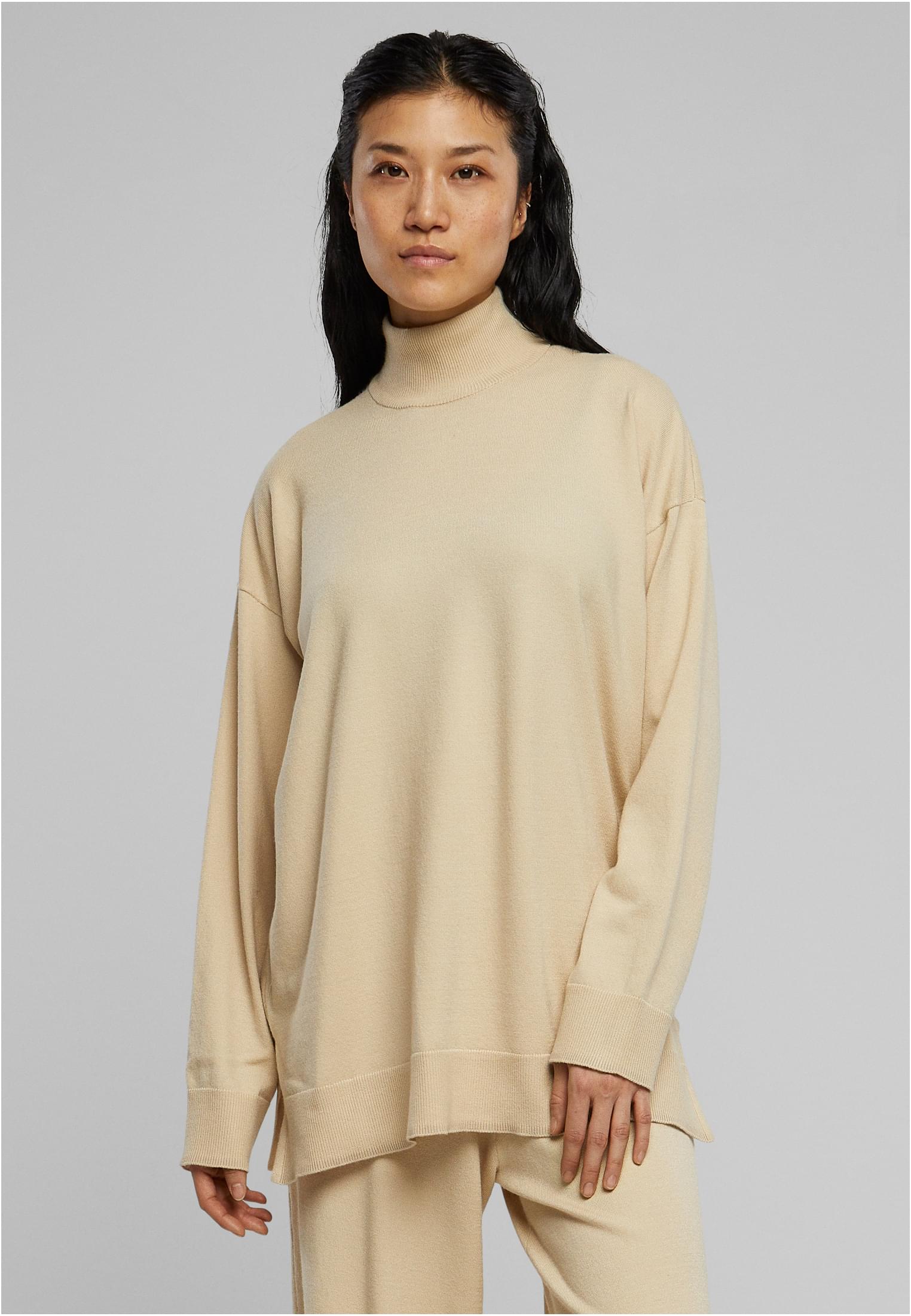 Women&#039;s knitted sweater made of eco-viscose with wet sand