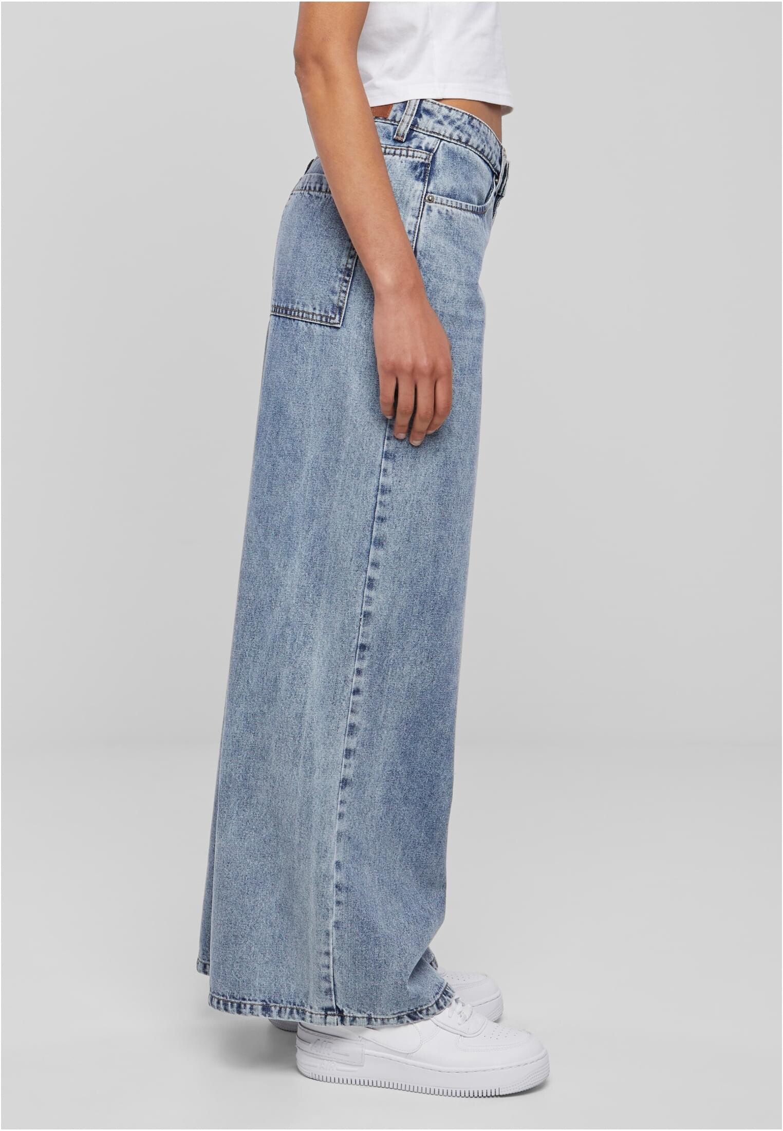 Women's jeans with a wide waist light blue denim