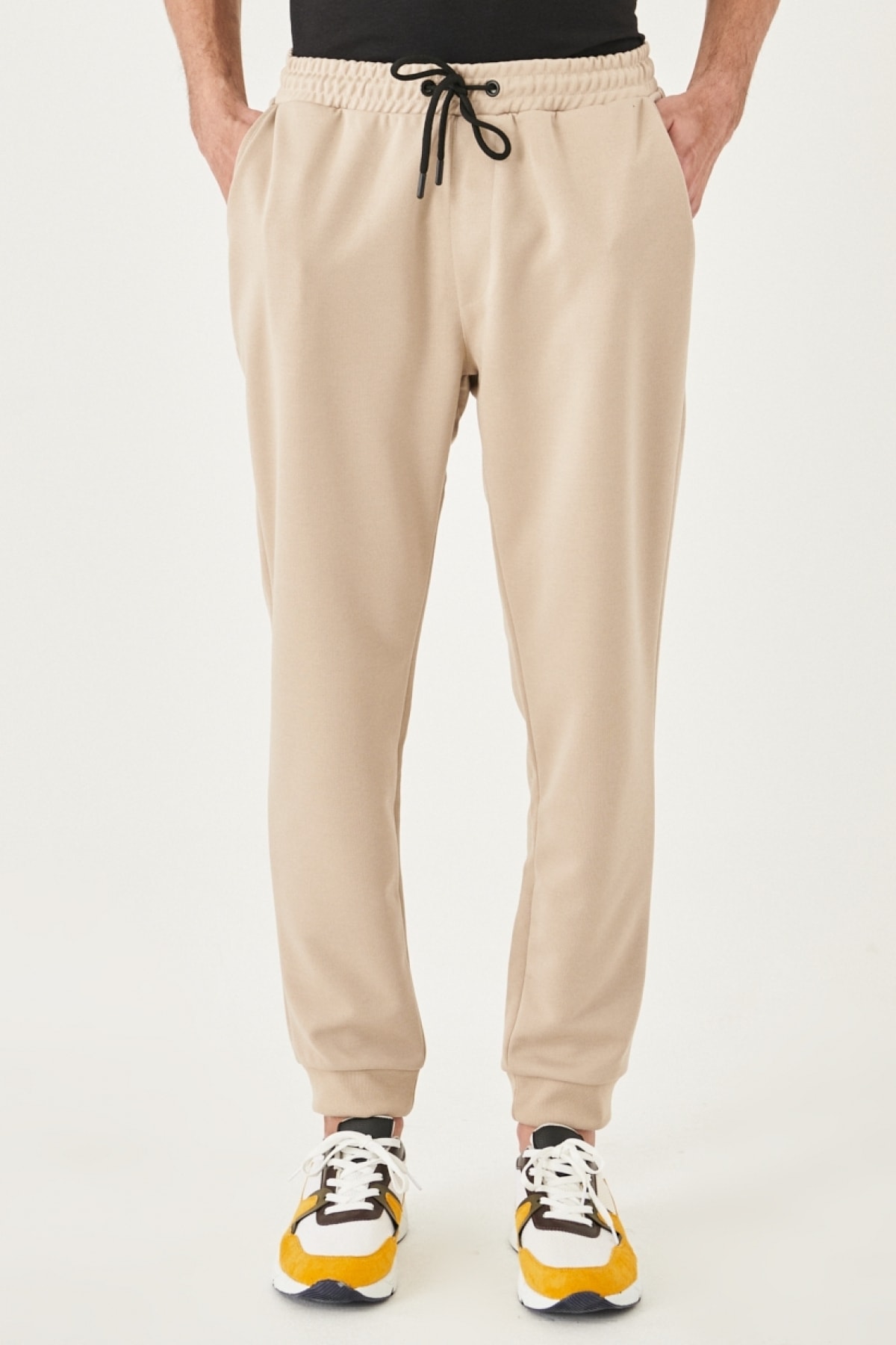 Levně AC&Co / Altınyıldız Classics Men's Beige Standard Fit Normal Cut, Elastic Waist And Legs. Comfortable Sports Sweatpants.