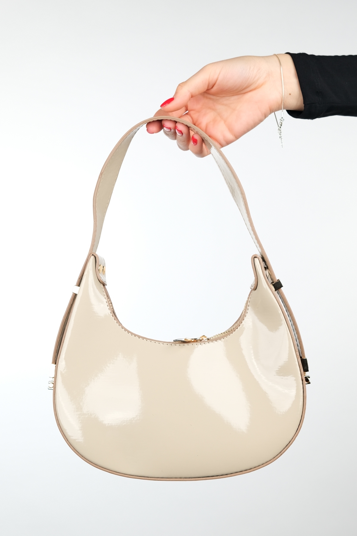 Levně LuviShoes SUVA Beige Patent Leather Women's Handbag