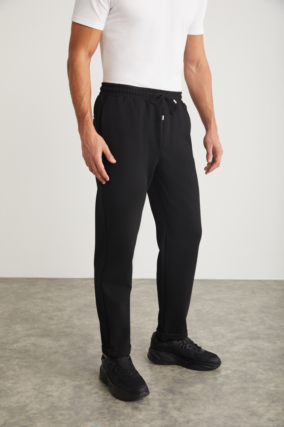 Levně GRIMELANGE Walsh Men&#39;s Pique Look Special Fabric Flexible Double Leg Corded Black Trousers with Elastic Waist