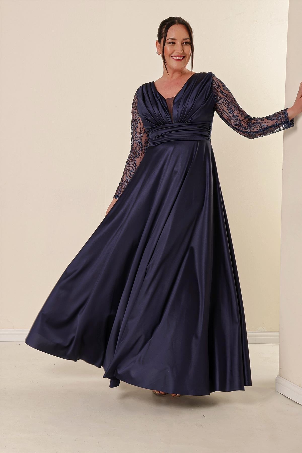 Levně By Saygı Plus Size Long Satin Evening Dress Navy Blue with Tulle Sleeves and Glitter Detail and Pleated Front