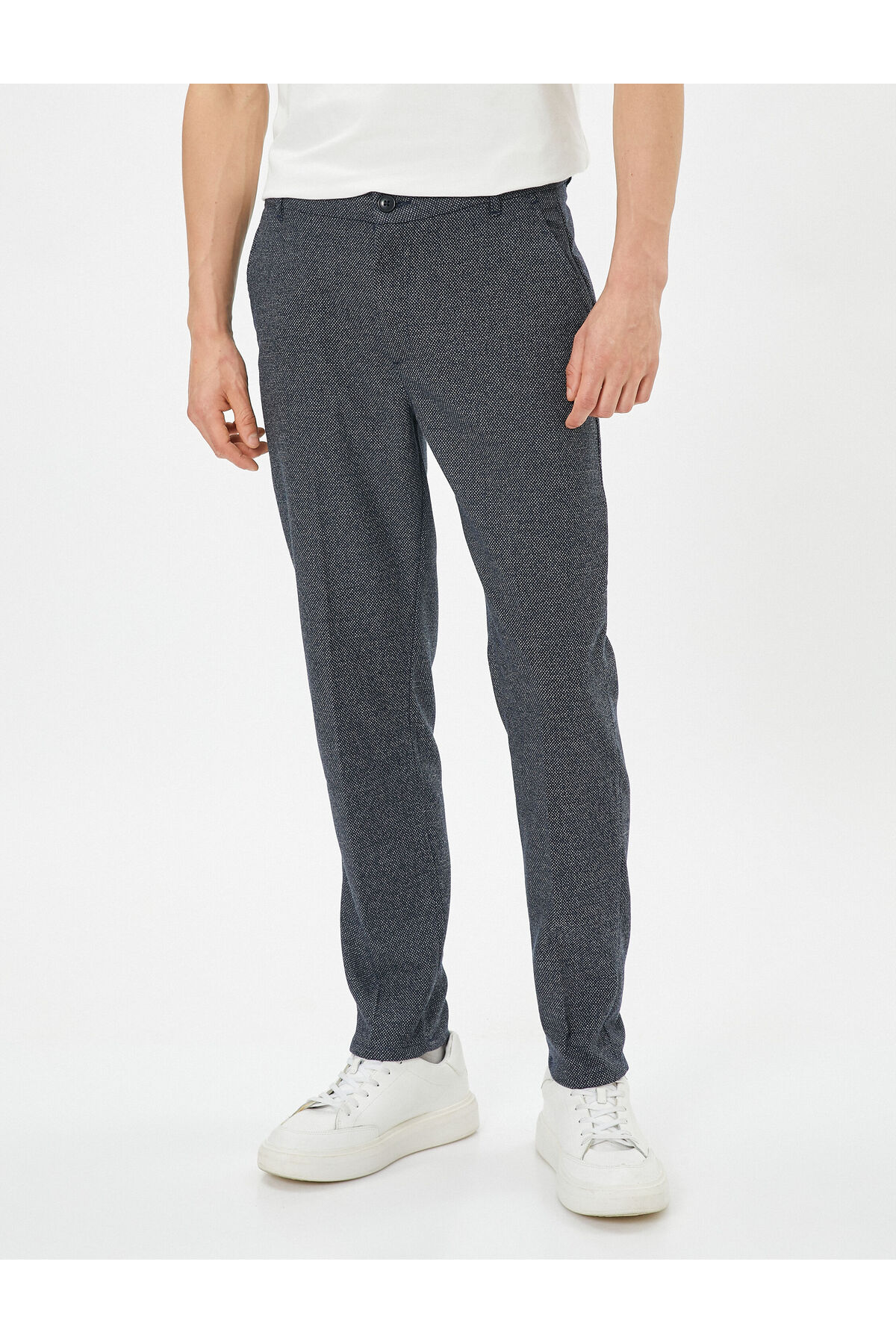 Koton Patterned Woven Trousers with Pockets and Buttons.