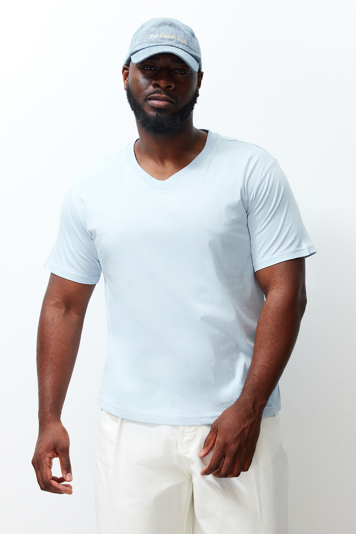 Levně Trendyol Plus Size Light Blue Slim/Narrow Cut V-Neck 100% Cotton Comfortable T-Shirt