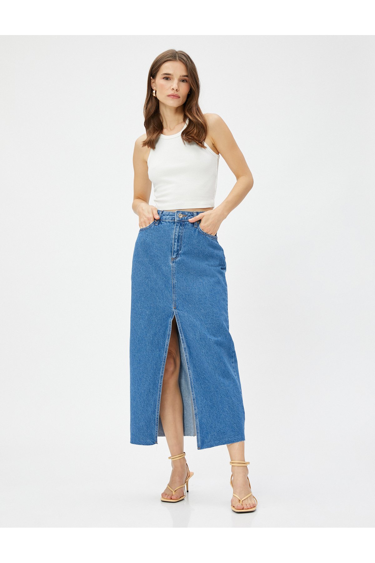 Koton Midi Denim Skirt with a Slit Detail Pocket and Button fastening.