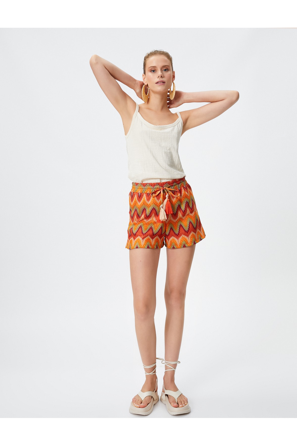 Koton Şahika Ercümen X Cotton - Tassel Detailed Mini Shorts with a Lace-Up Waist.