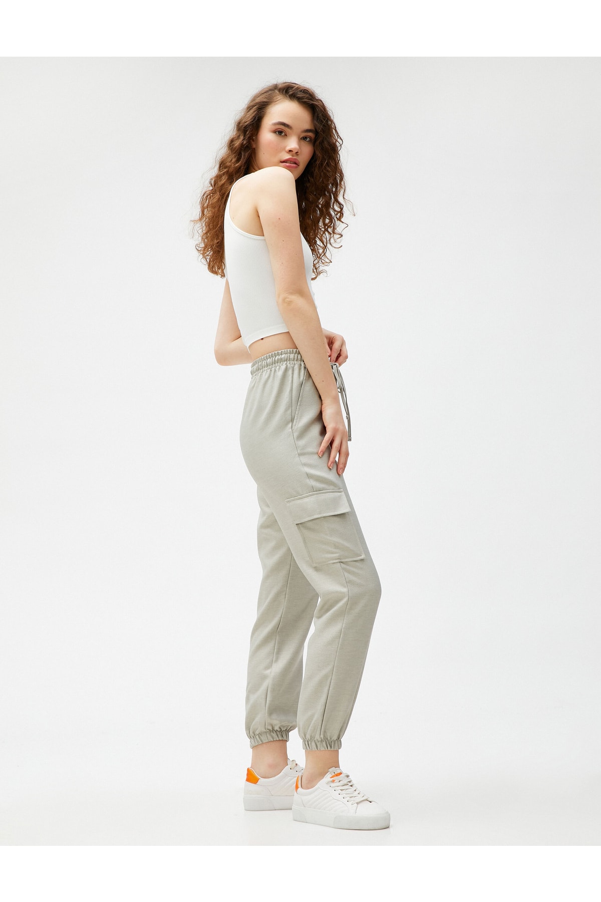 Levně Koton Cargo Pants with a lace-up waist, pocket detail and elasticated legs.