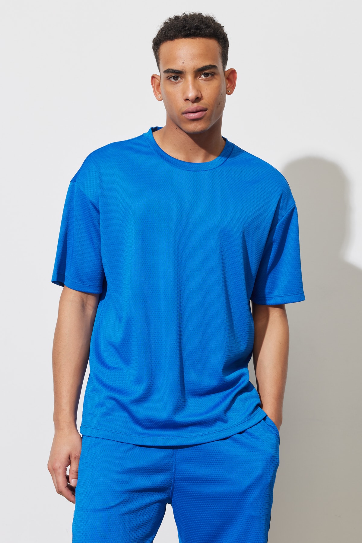 AC&Co / Altınyıldız Classics Men's Saks Blue Loose Fit Crew Neck Soft Textured Sports T-Shirt