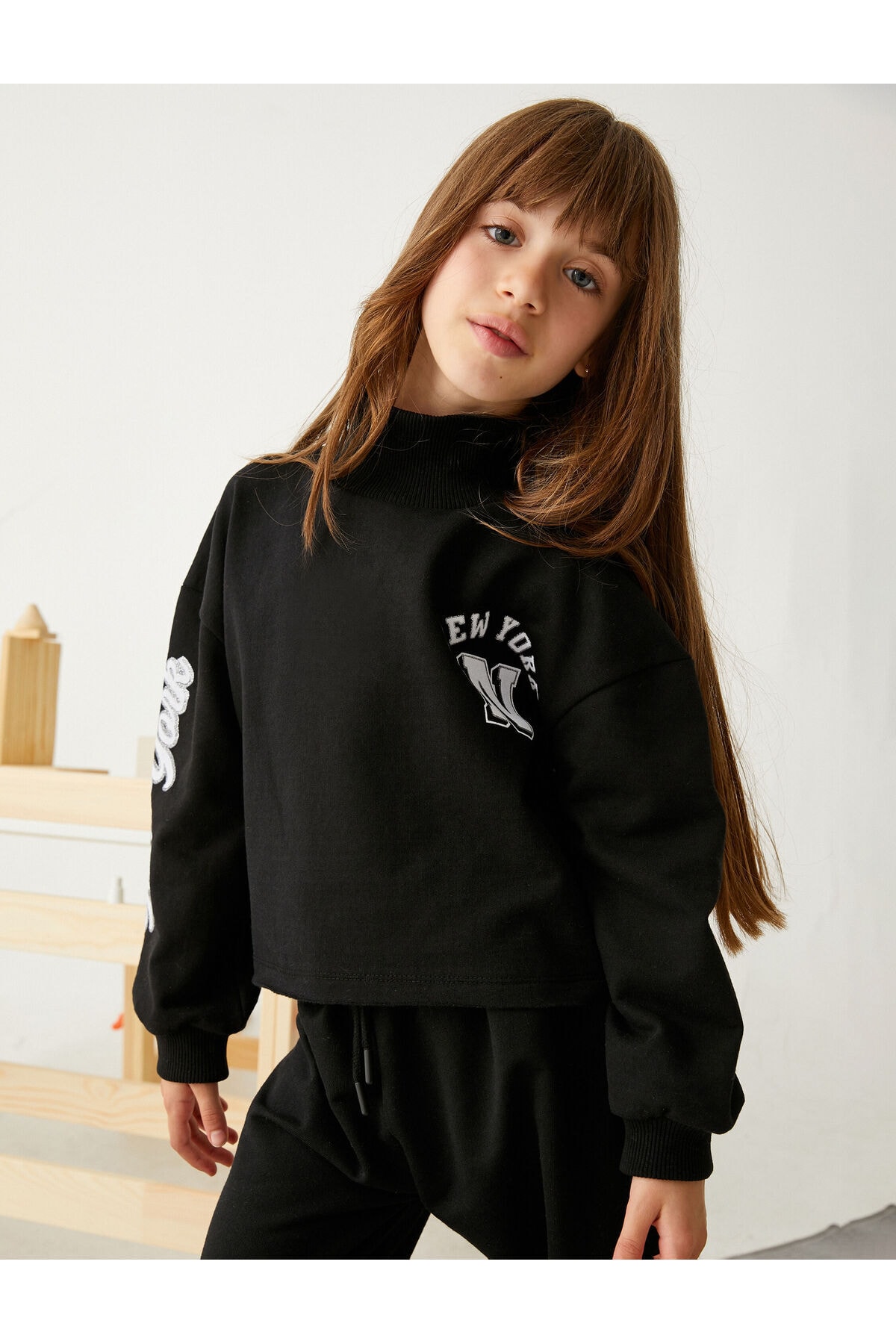 Koton Oversized Turtleneck Sweatshirt with New York Print.