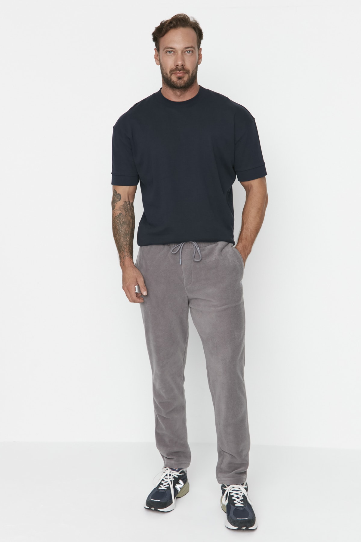 Levně Trendyol Gray Men's Regular/Normal Cut Label Appliqued Rubber Leg Sweatpants