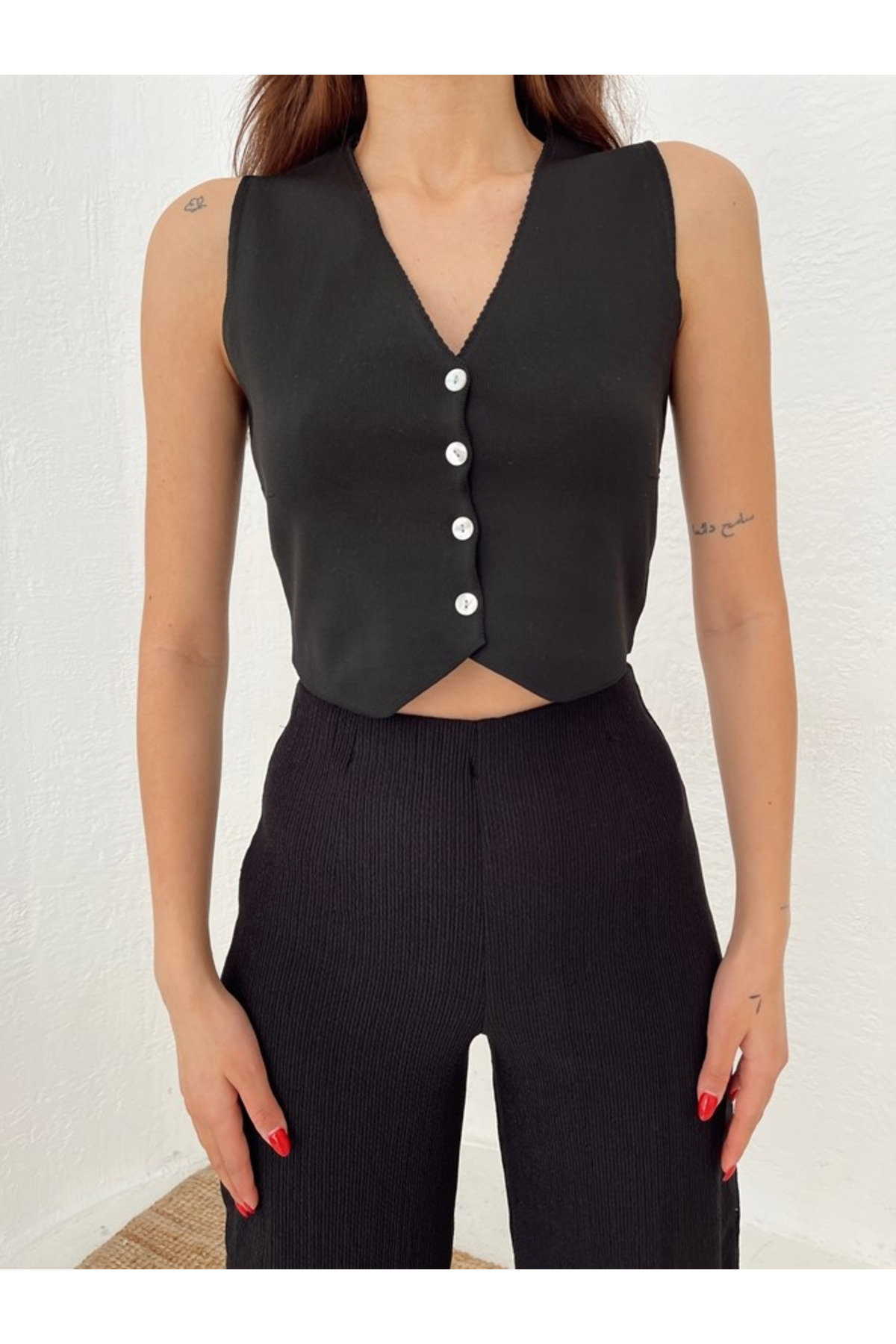 Levně Laluvia Black Buttoned Knitwear Vest