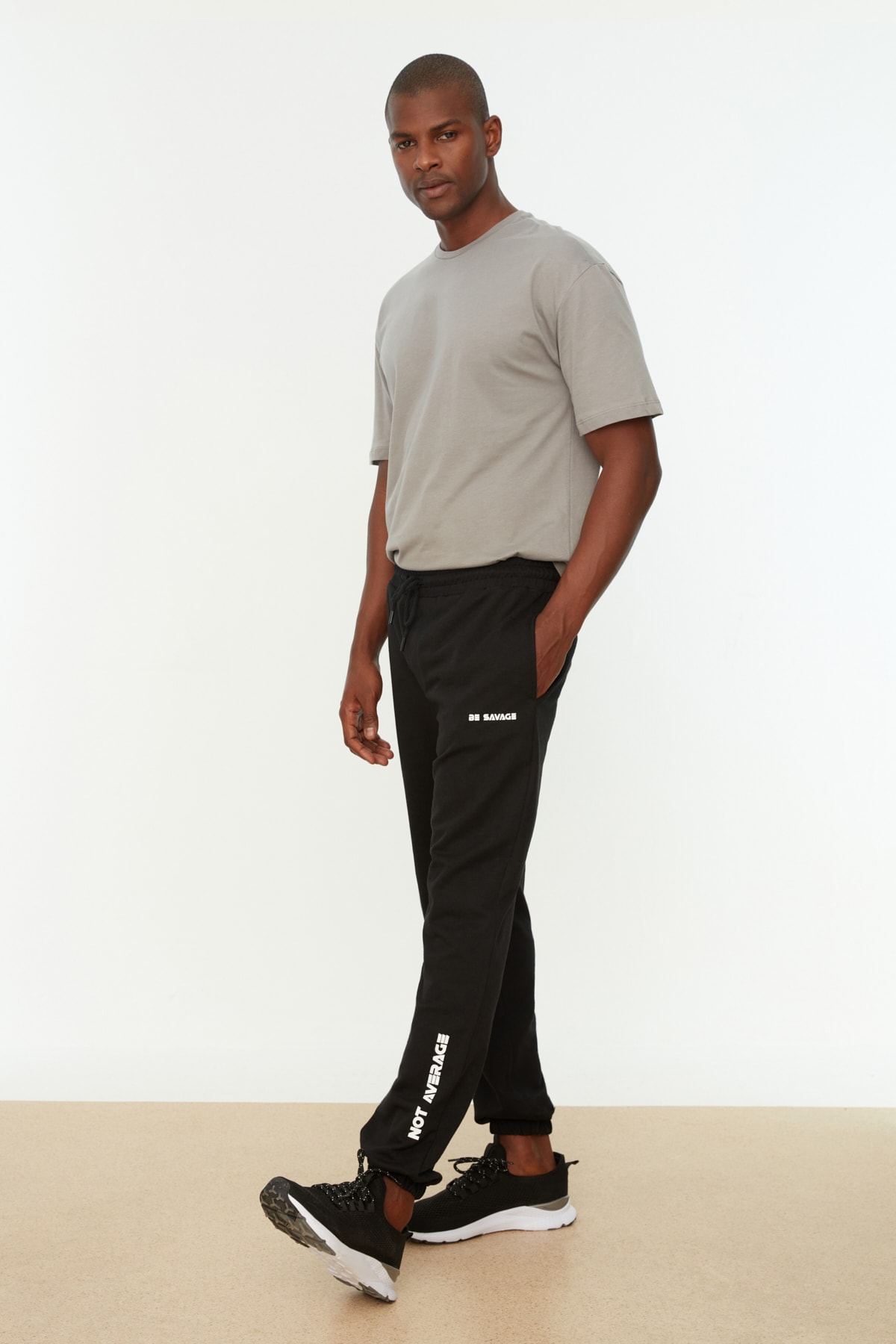 Trendyol Men's Black Regular/Regular Cut, Text And Print Jogger Sweatpants With Elastic Legs.