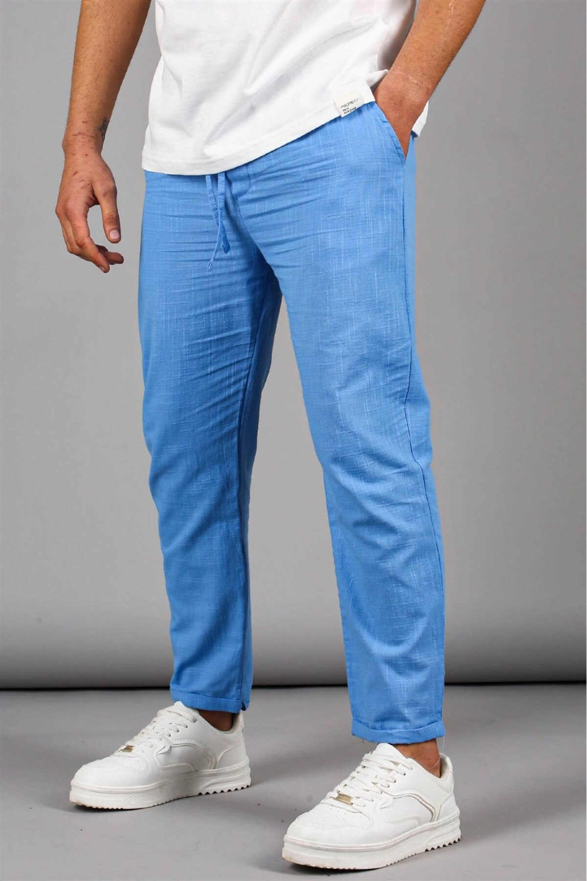 Levně Madmext Blue Muslin Fabric Men's Basic Trousers 5491