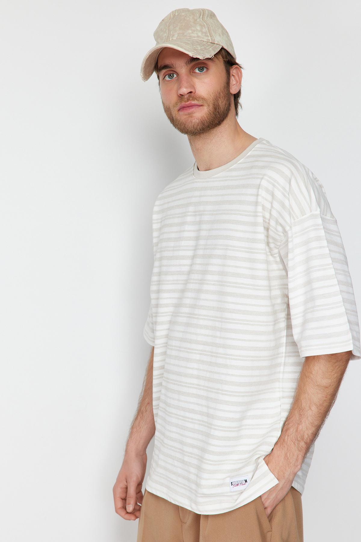 Levně Trendyol Ecru Oversize/Wide Cut Striped Label Short Sleeve Textured T-Shirt
