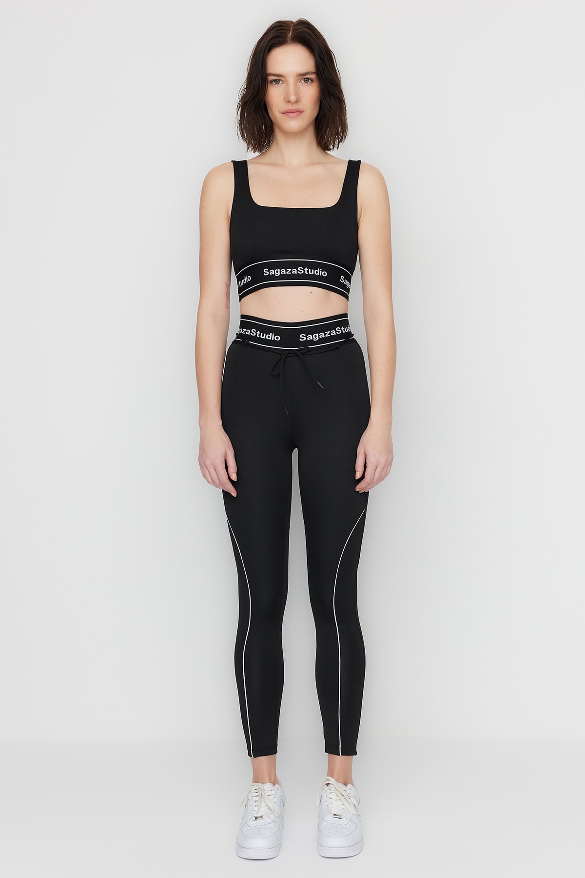 Levně Trendyol X Sagaza Studio Black Stretchy Sports Tights with Piping Detailed and Push-Up Stitching.