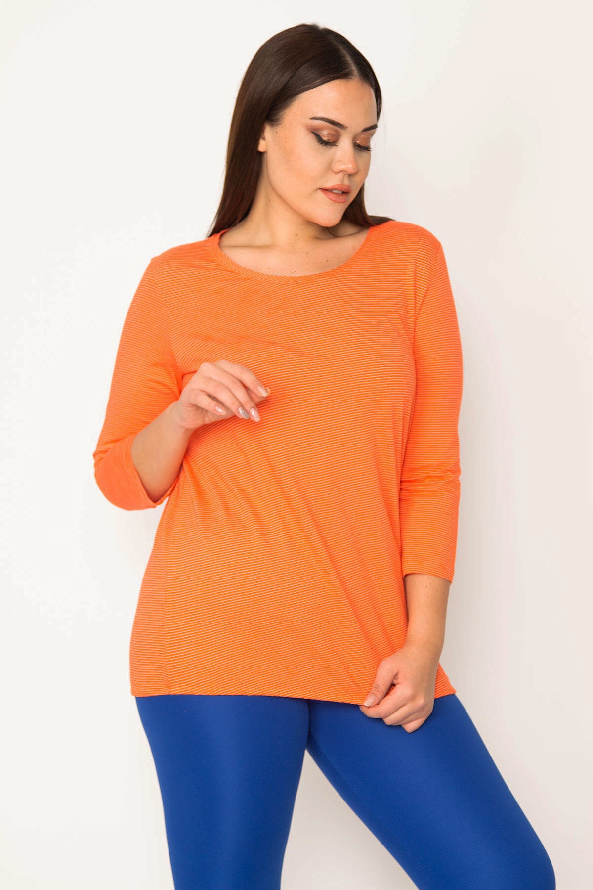 Levně Şans Women's Plus Size Orange Pinstripe Blouse with Elastic Hem