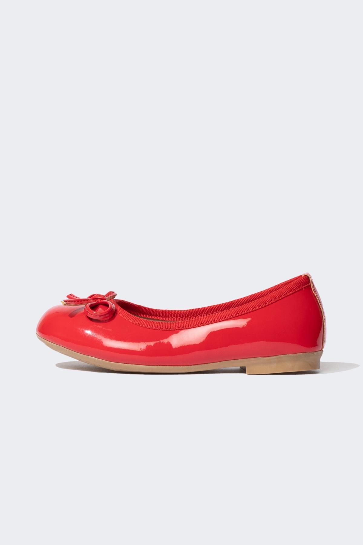 DEFACTO Girl's Red Faux Leather Patent Leather Flat Shoes with a flat sole.