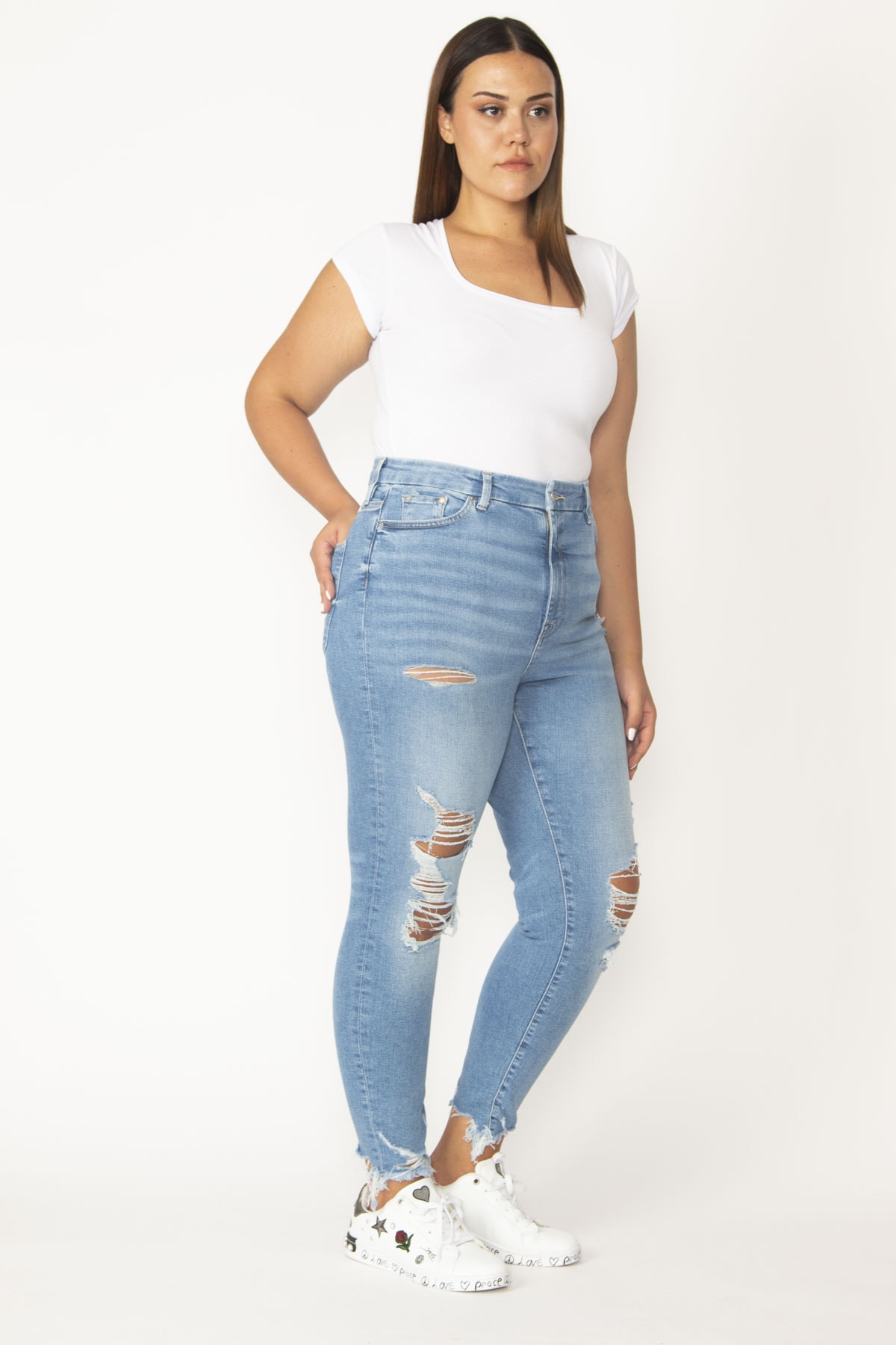 Levně Şans Women's Plus Size Blue Ripped Detailed Washed Effect 5-Pocket Skinny Jeans
