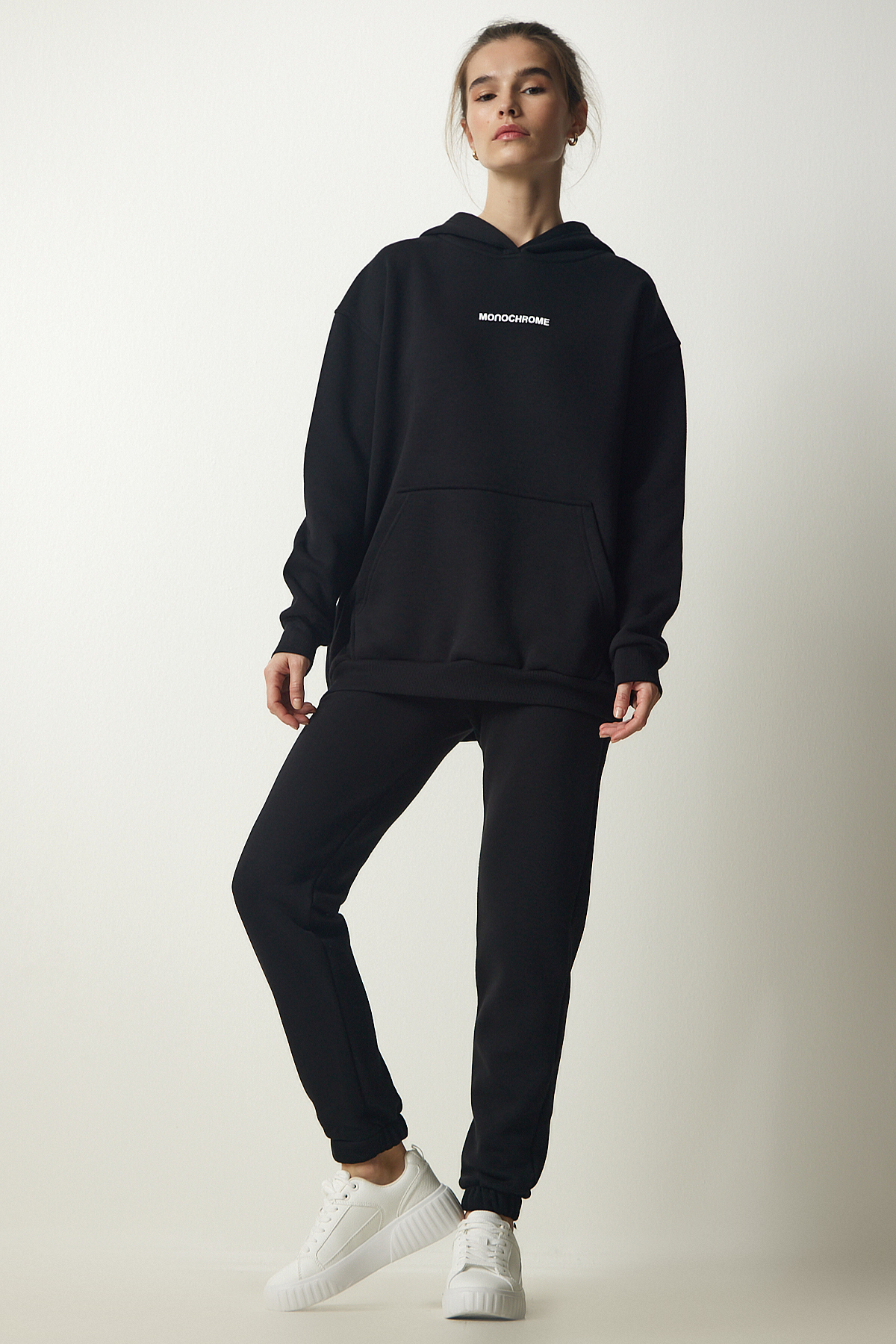 Levně Happiness İstanbul Women's Black Raised Knitted Tracksuit