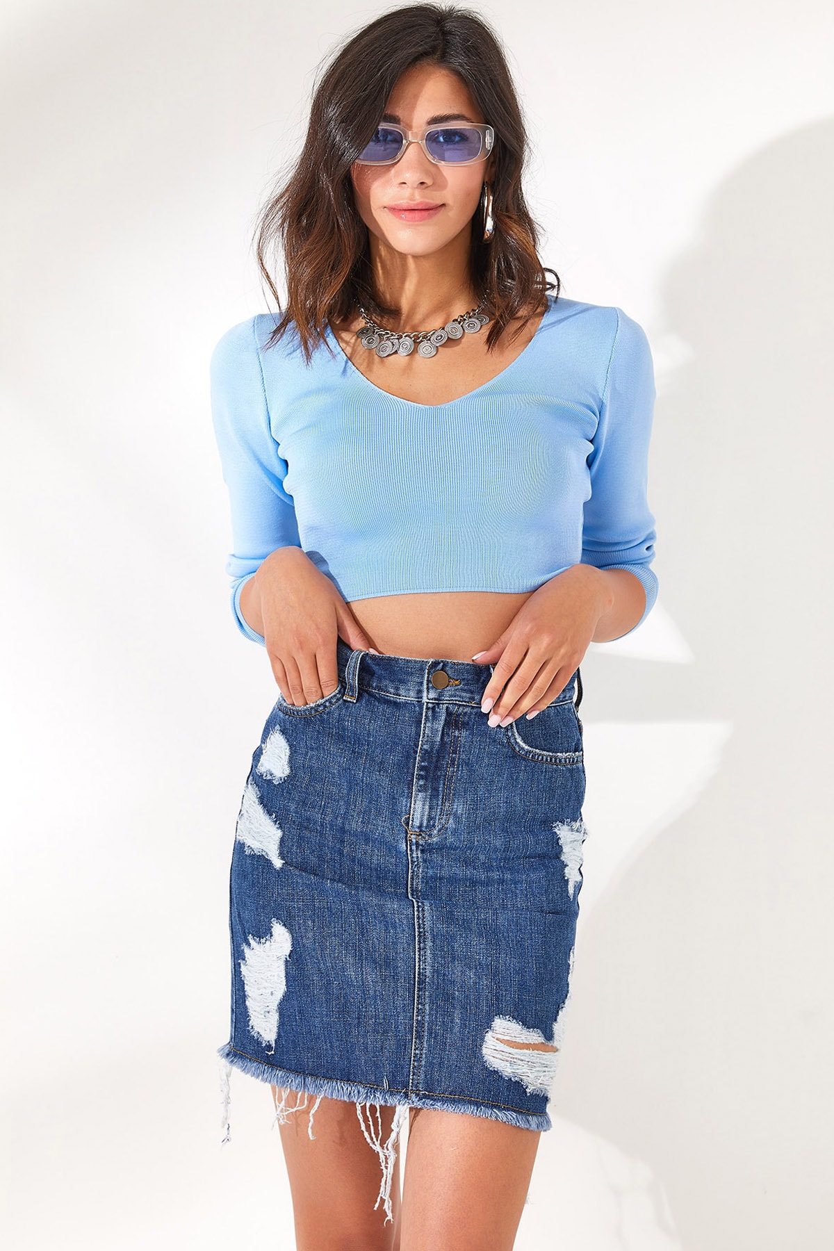 Olalook Women's Blue Mini Denim Skirt with Pockets and Torn Detail