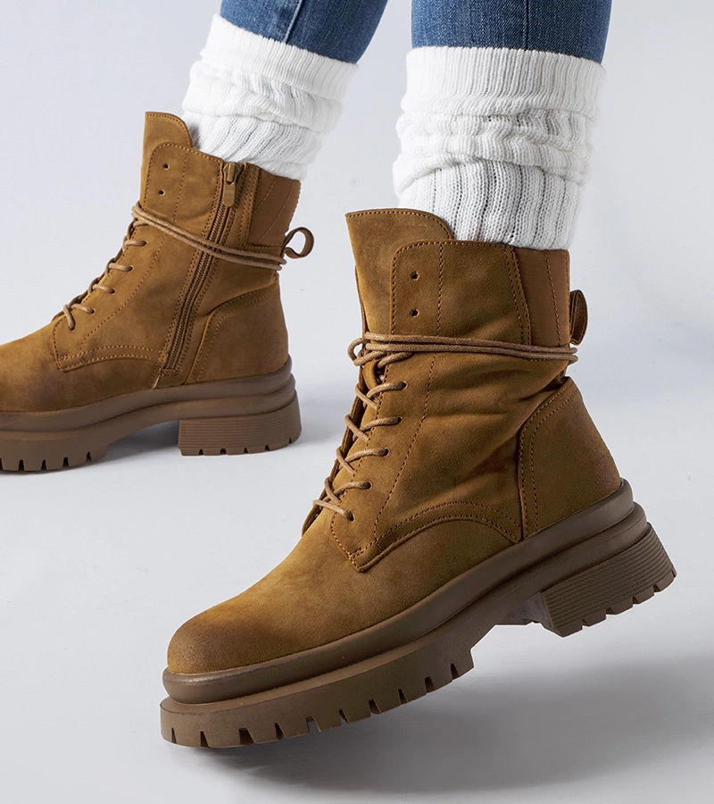 Gemre Vadnais brown boots with a distressed toe