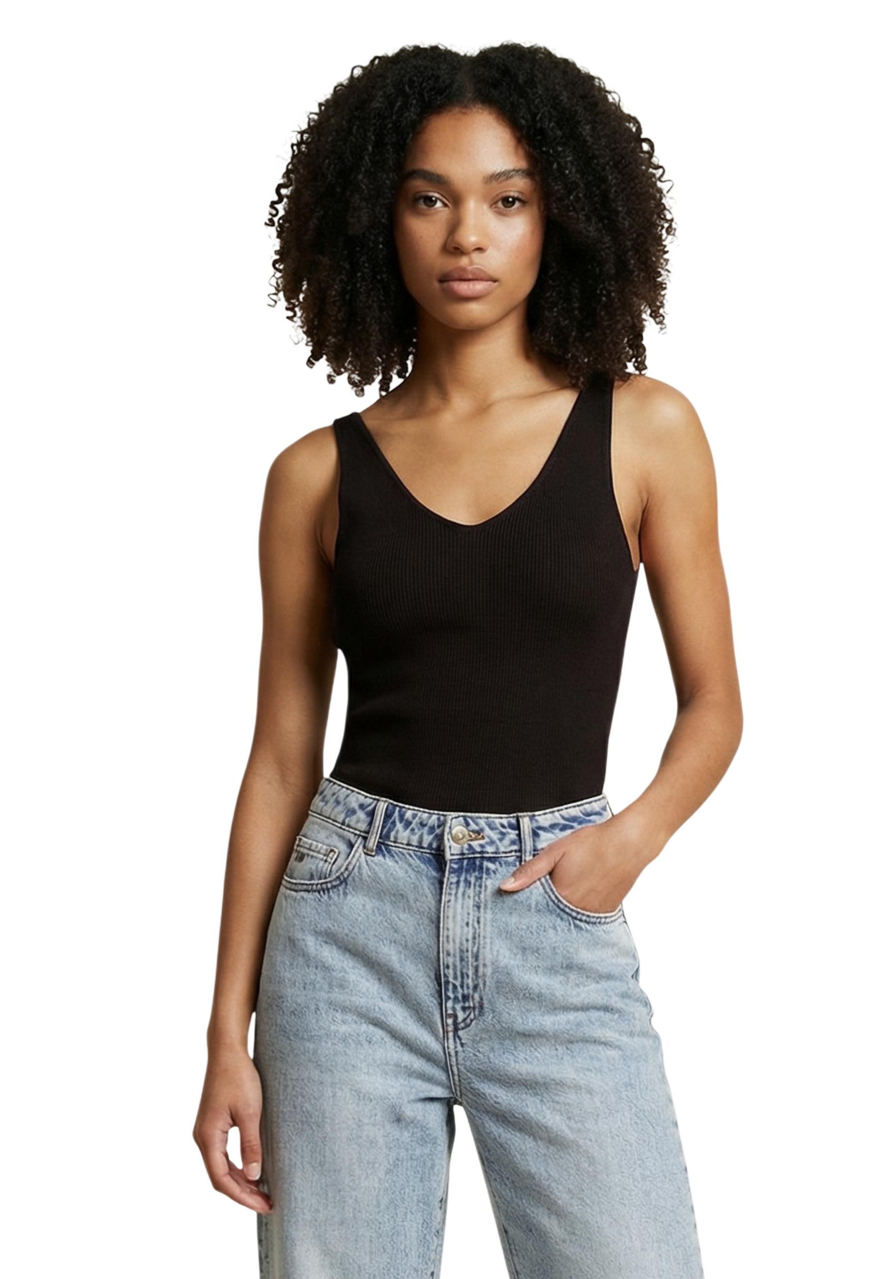 Блузи без презрамки на Жаклин де Йонг