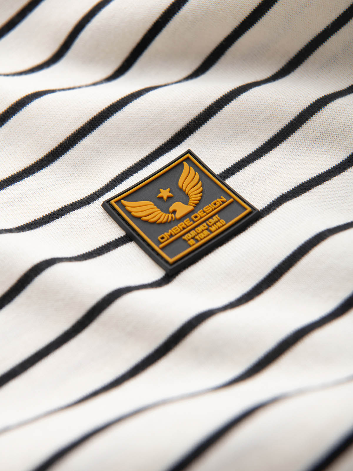Men's striped t-shirt with patch by Ombre Design - cream and black