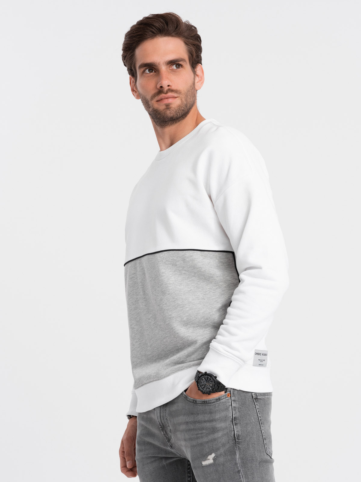 Levně Ombre Men's OVERSIZE sweatshirt with contrasting color combination - white and gray