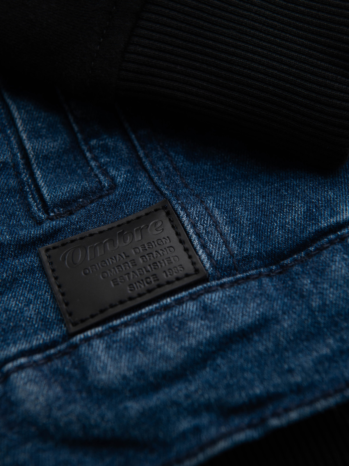 Ombre Men&#039;s denim jacket with knitted sleeves and hood - blue and black