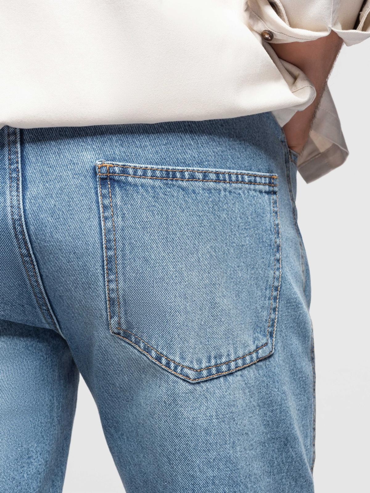 Ombre Men's short denim shorts with rips and holes - light blue