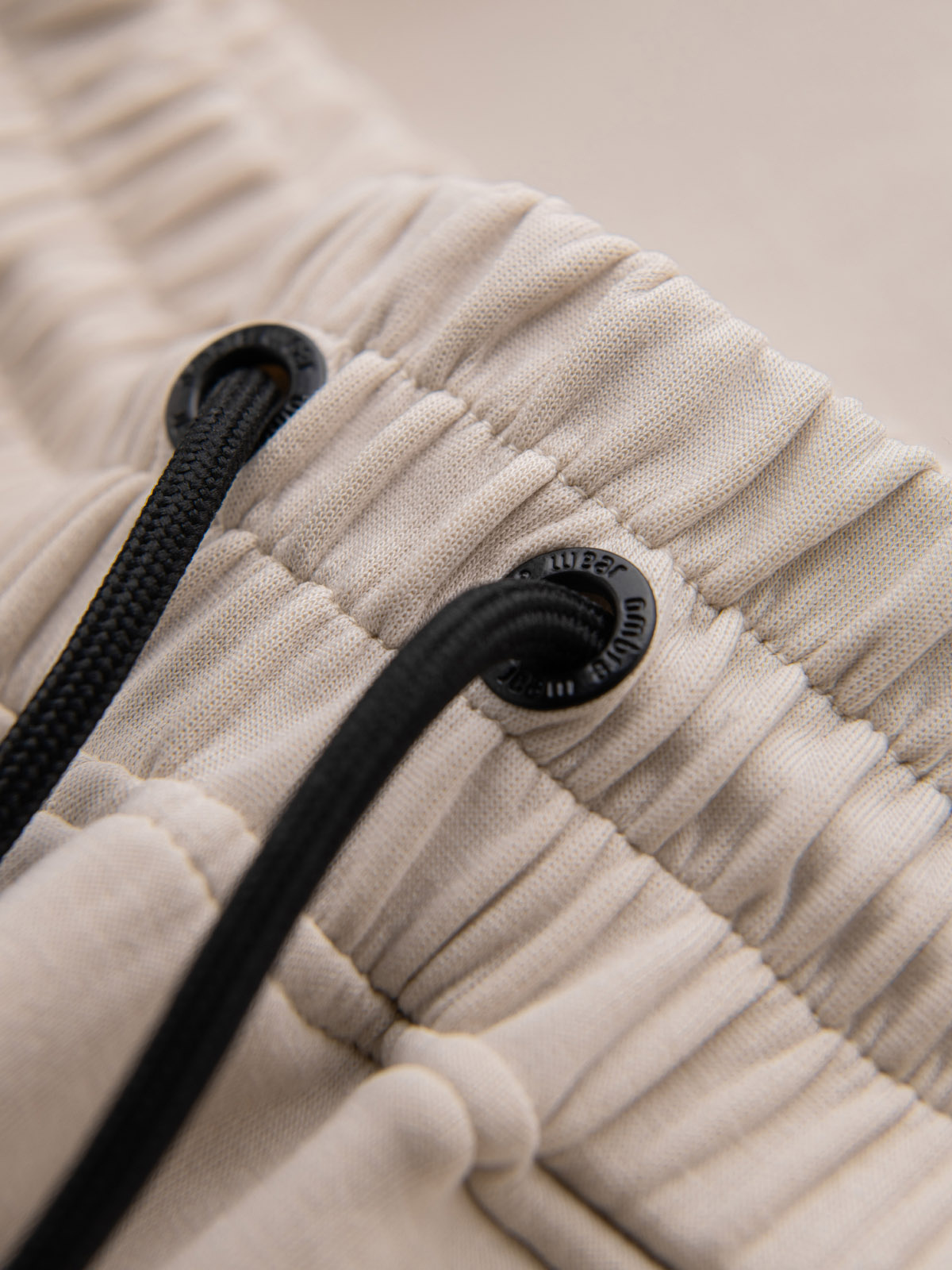 Ombre Men's sweatpants with ribbed cuffs and decorative zipper - sand