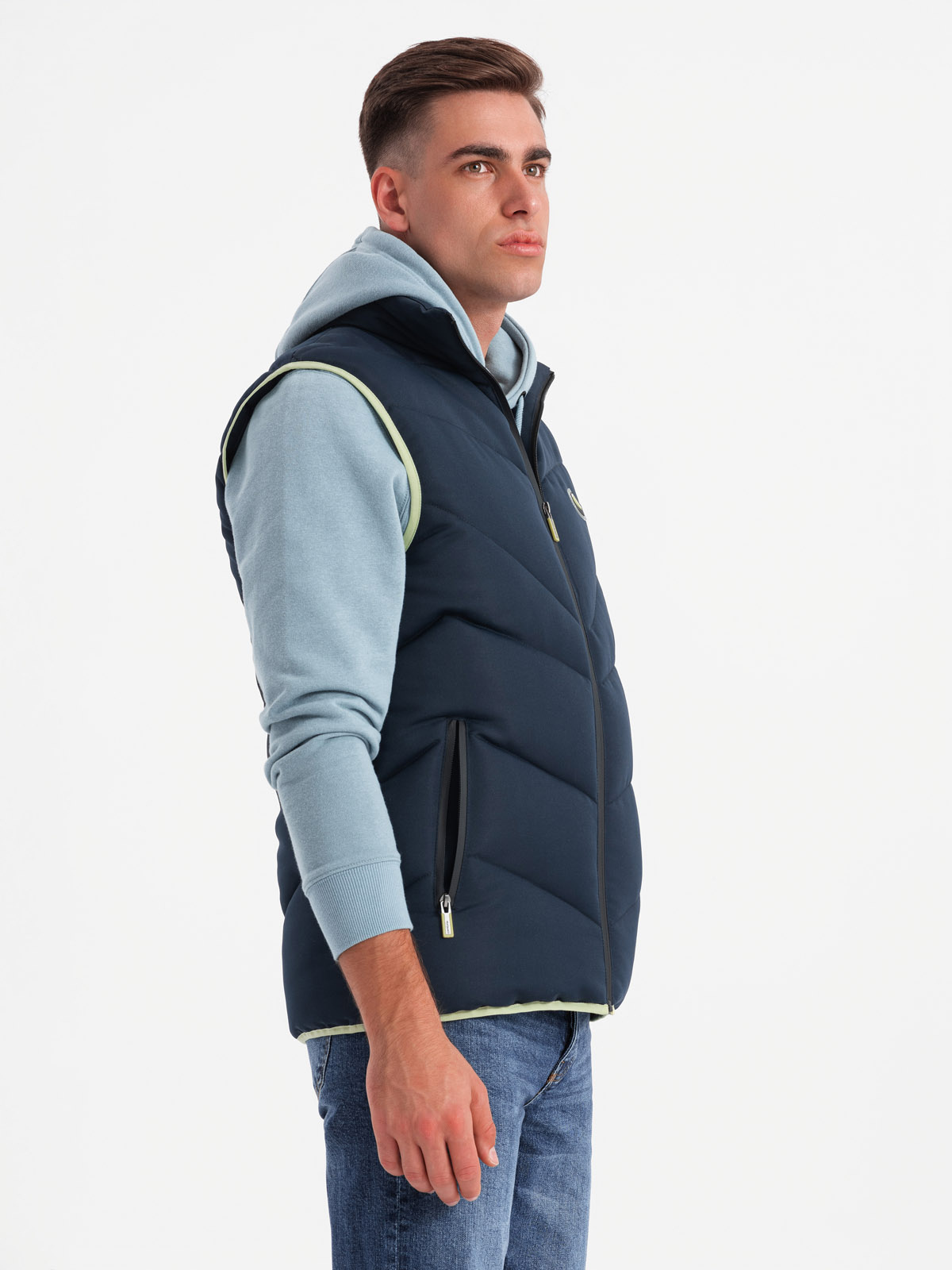 Ombre Men&#039;s quilted sleeveless jacket with neon accents - navy blue