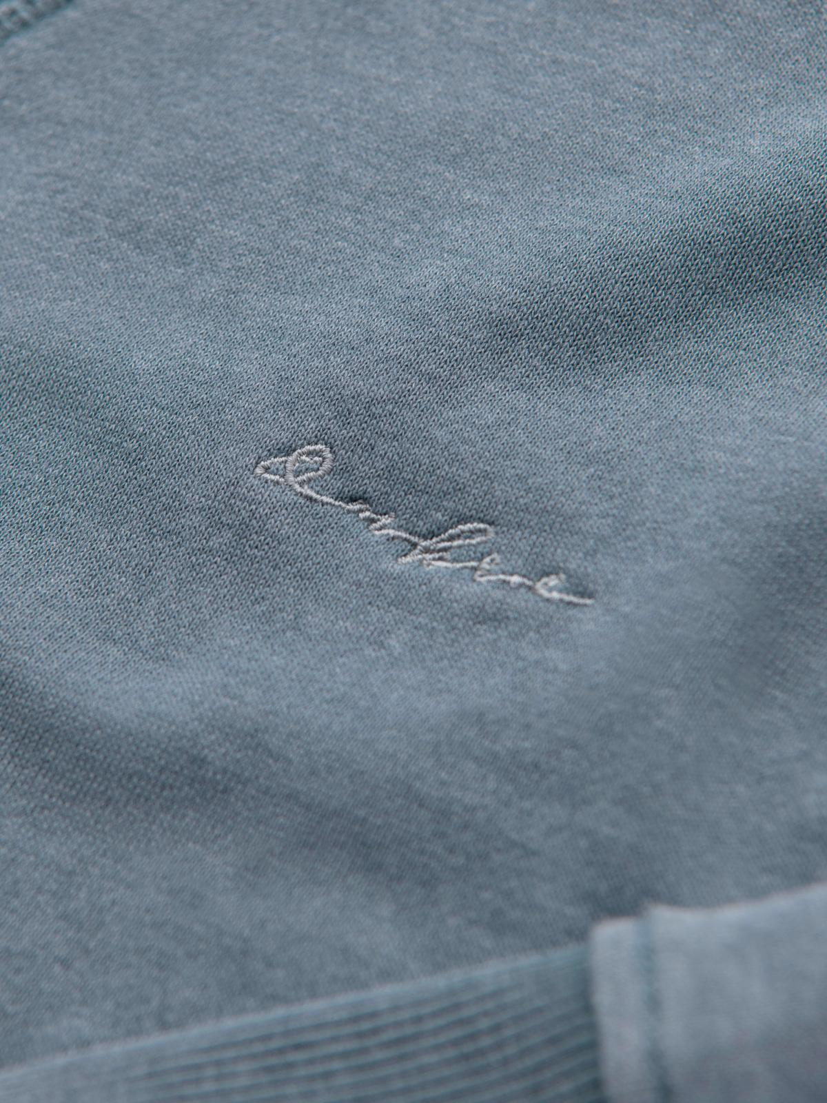 Ombre Washed men&#039;s sweatshirt with decorative stitching at the neckline - light blue