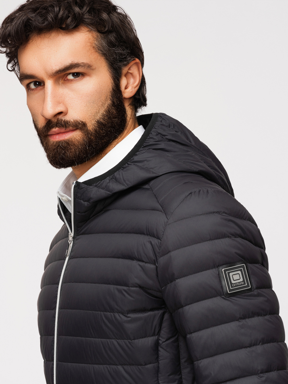 Ombre Ultralight men's natural down jacket with stowable pouch - black