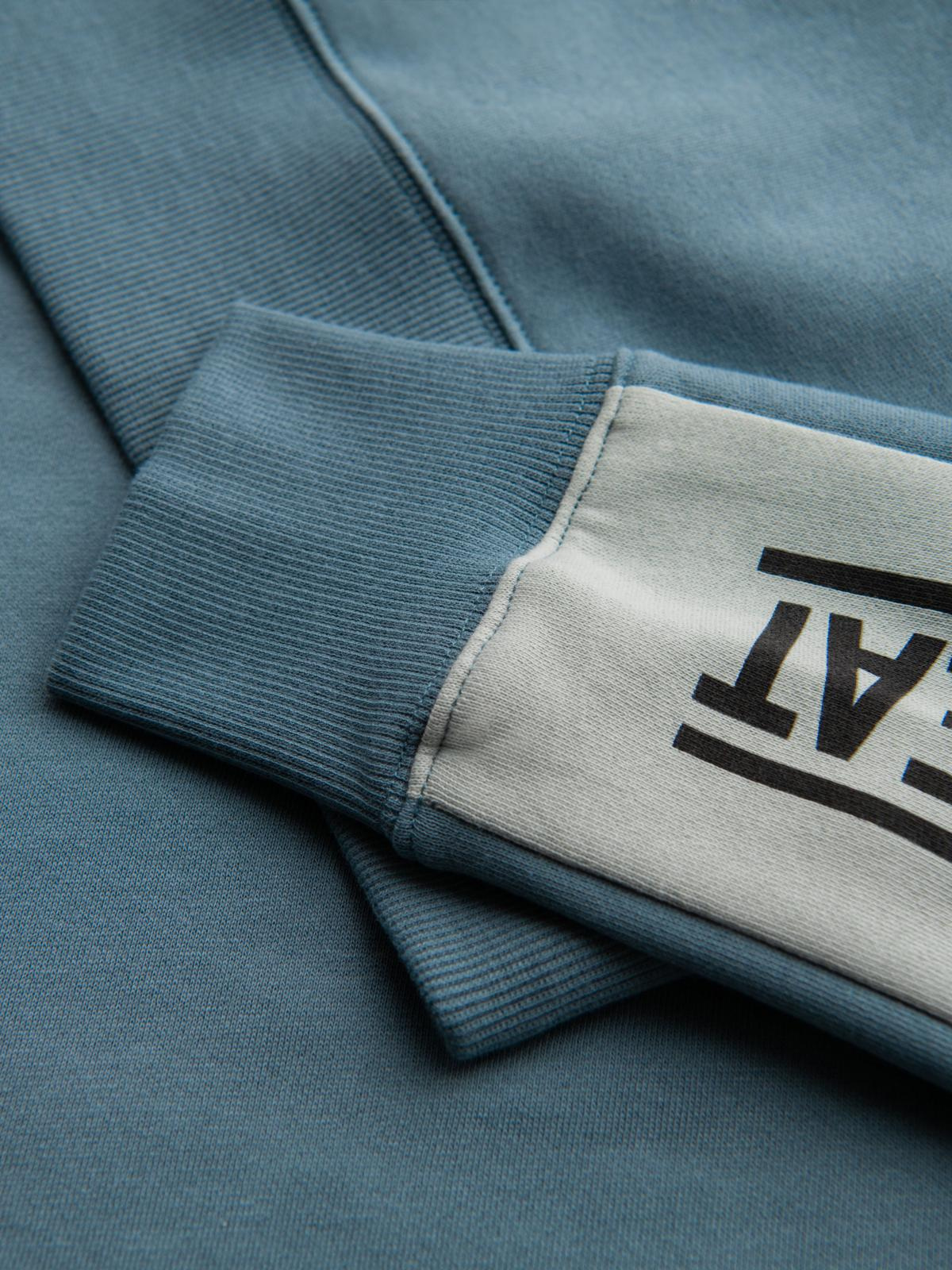 Ombre Men's sweatshirt with contrasting stripes and raglan sleeves - bleached turquoise