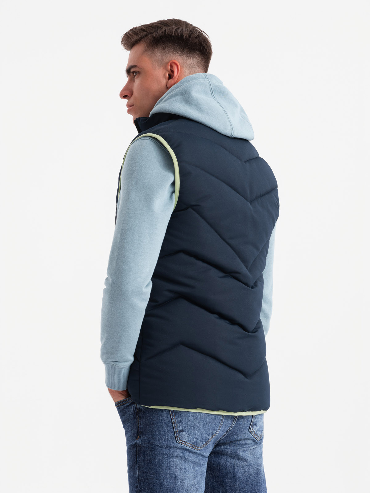 Ombre Men&#039;s quilted sleeveless jacket with neon accents - navy blue