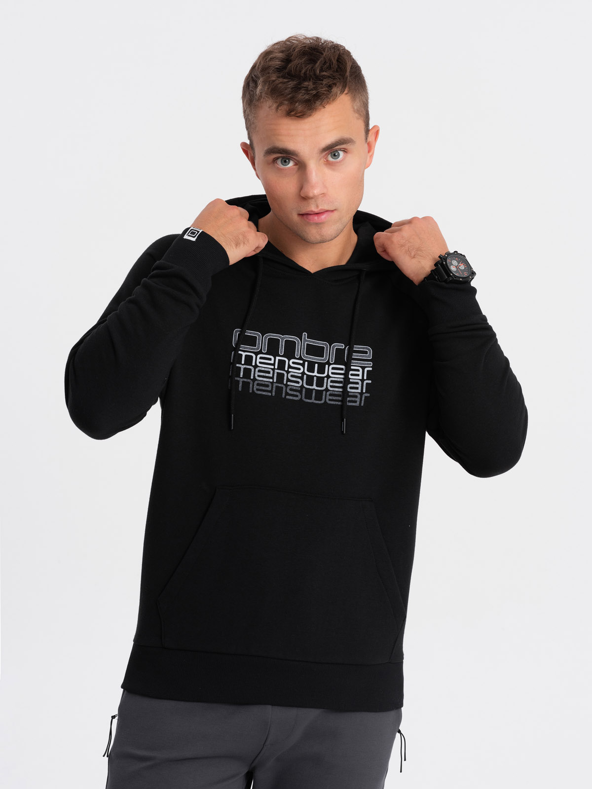 Levně Ombre Men's non-stretch hooded sweatshirt with print - black