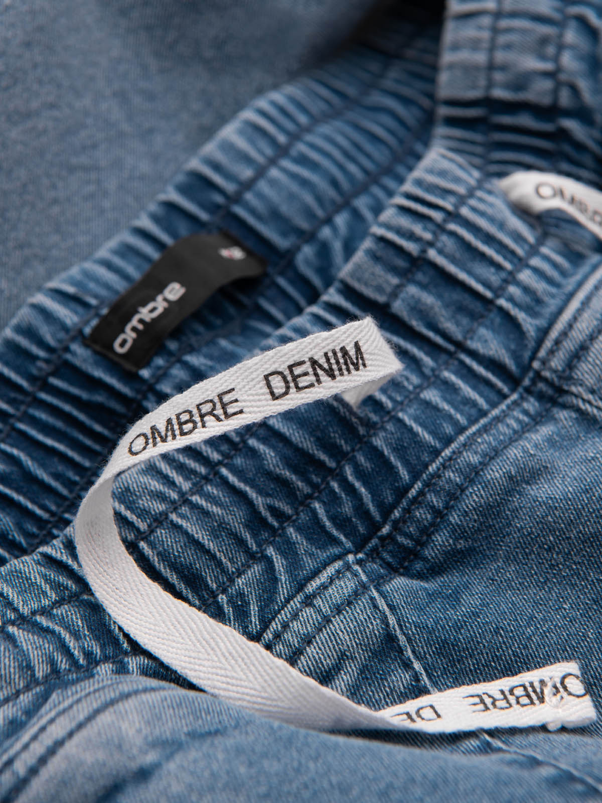 Ombre Men&#039;s denim joggers with asymmetrical stitching - blue