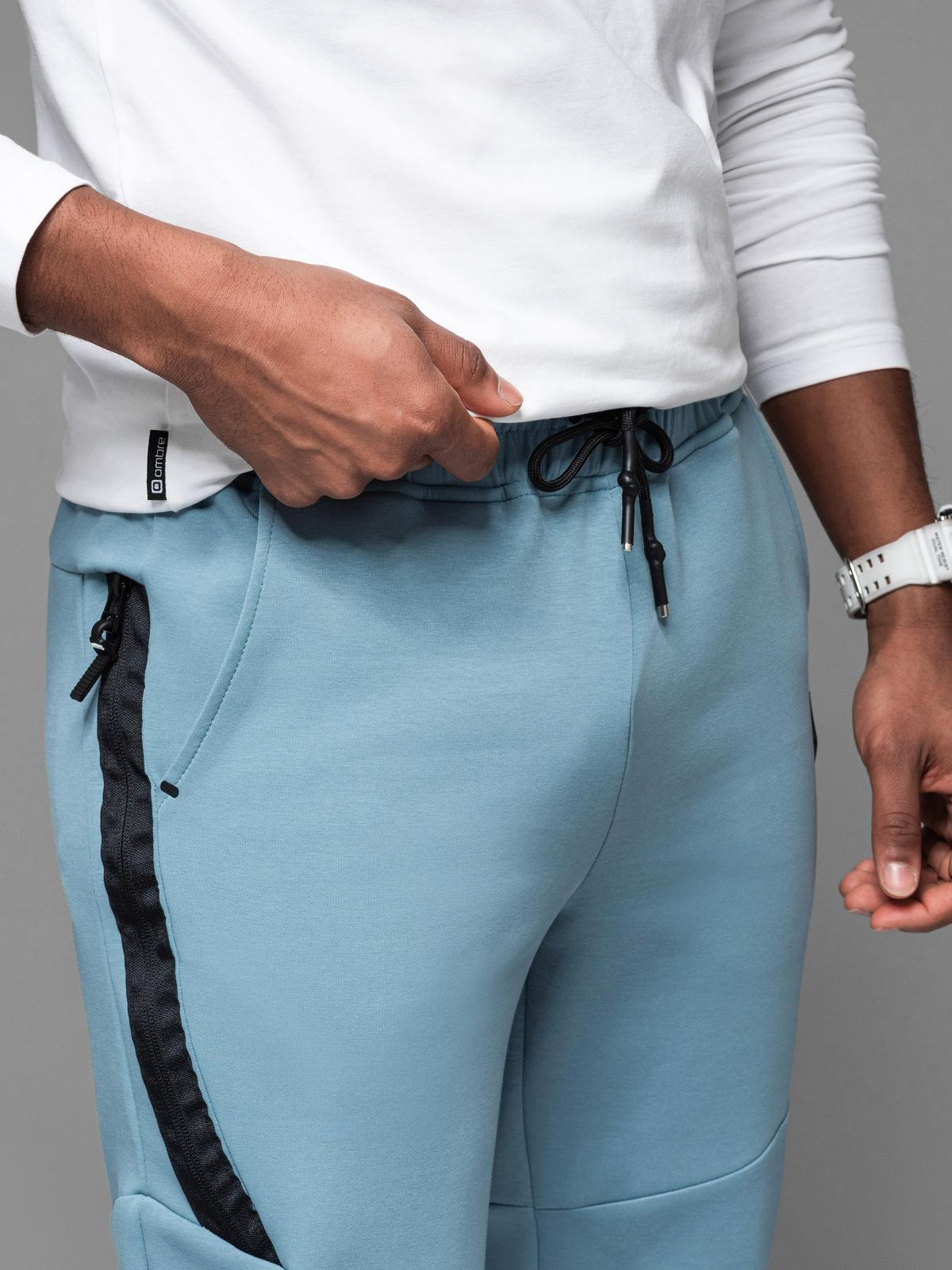 Ombre Men&#039;s sweatpants with ribbed cuffs and decorative zipper - light blue