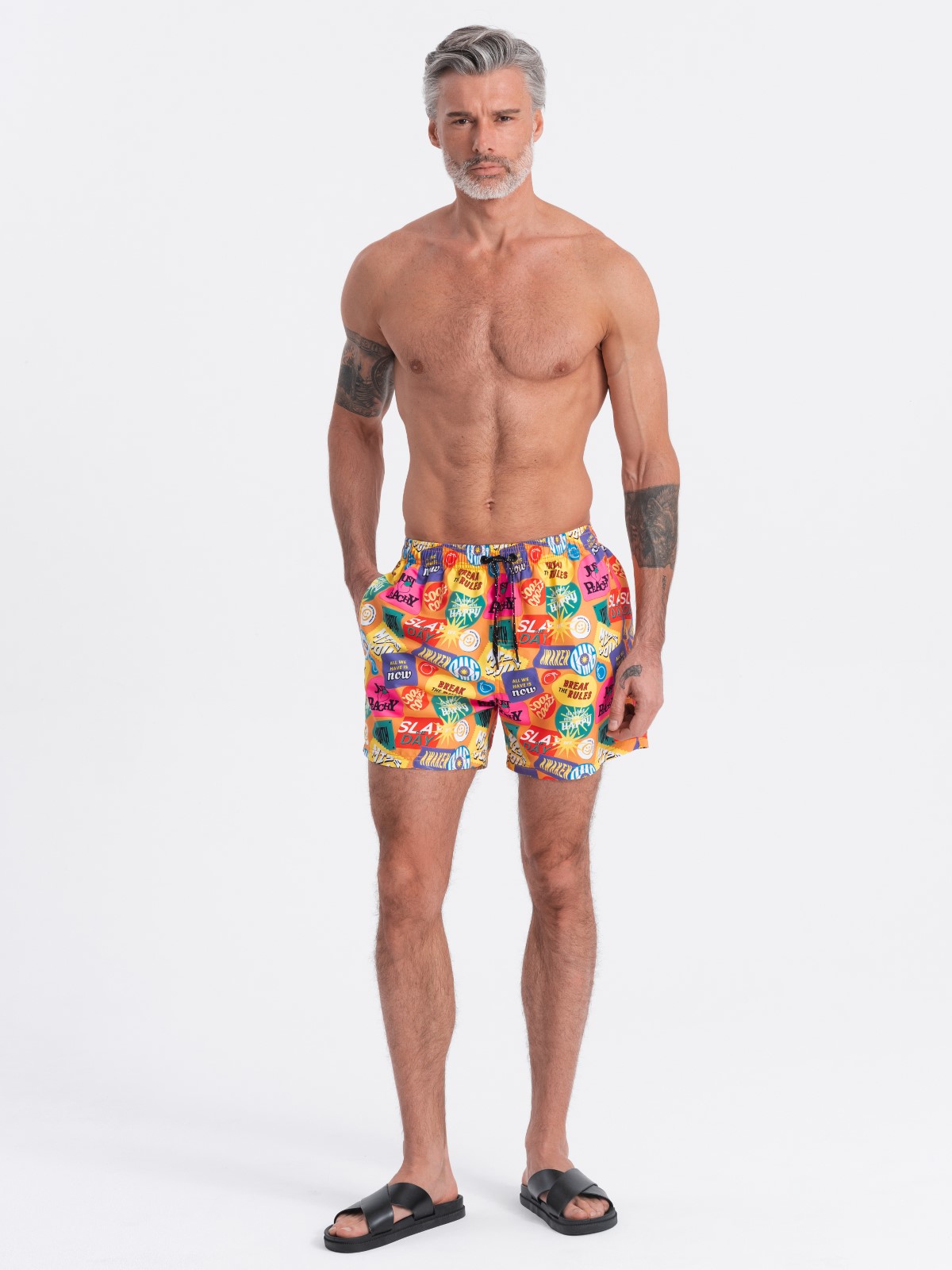 Levně Ombre Men's swim shorts in lettering - multicolor