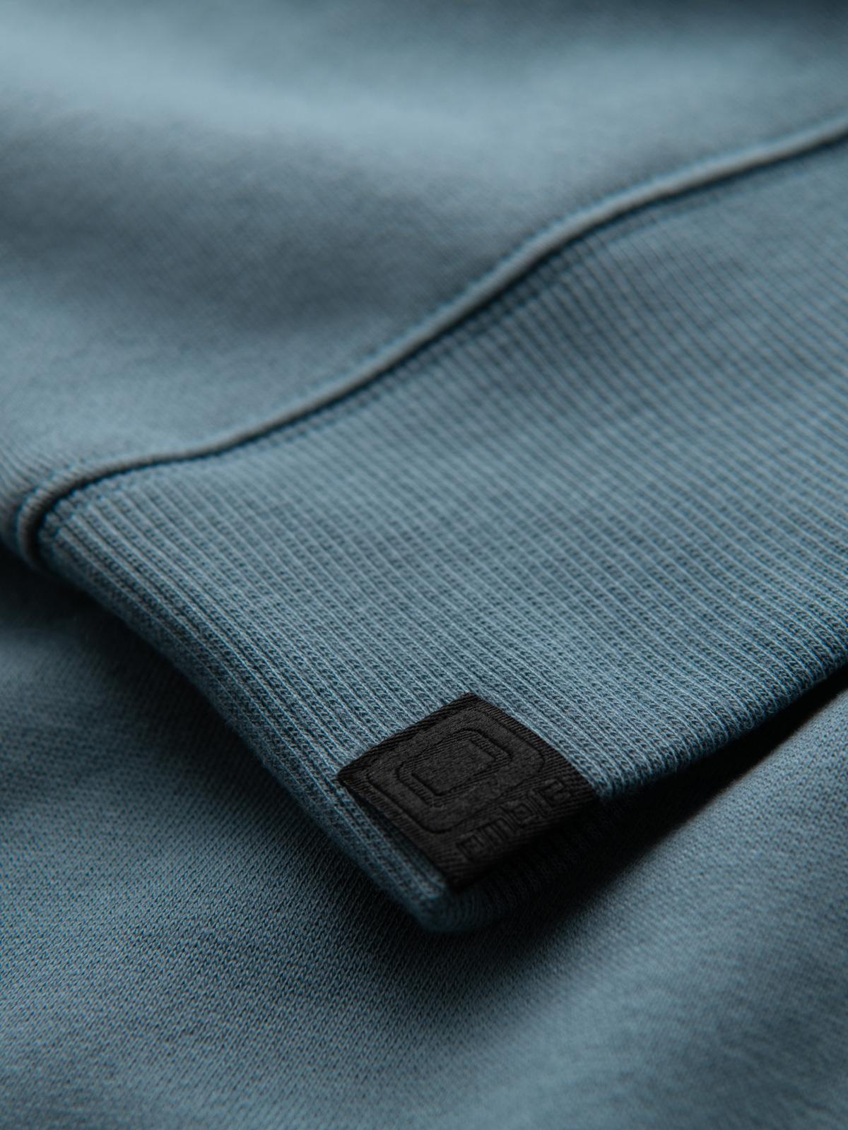 Ombre Men's sweatshirt with contrasting stripes and raglan sleeves - bleached turquoise