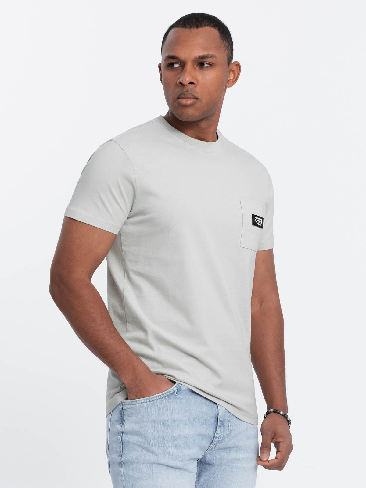 Levně Ombre Casual men's t-shirt with patch pocket - pale green