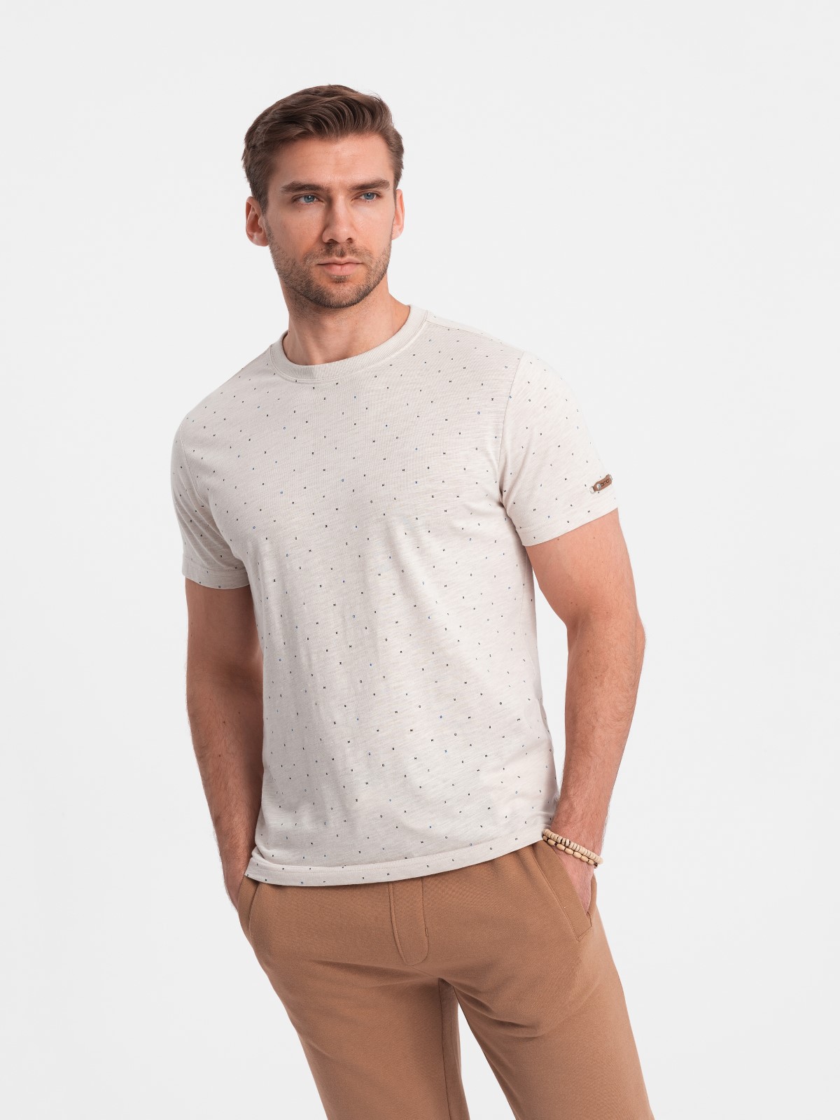 Levně Ombre Men's full-print t-shirt with colorful letters - light beige
