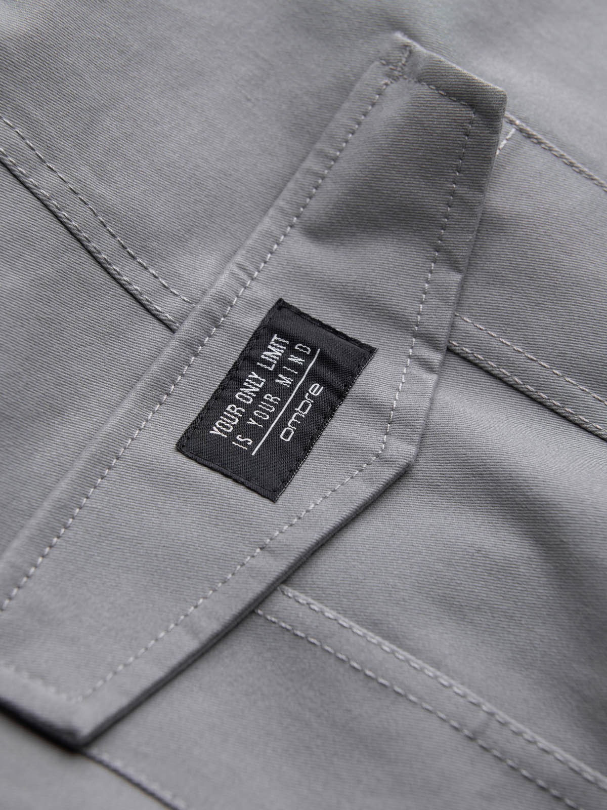 Ombre Men&#039;s pants with cargo pockets and leg hem - grey