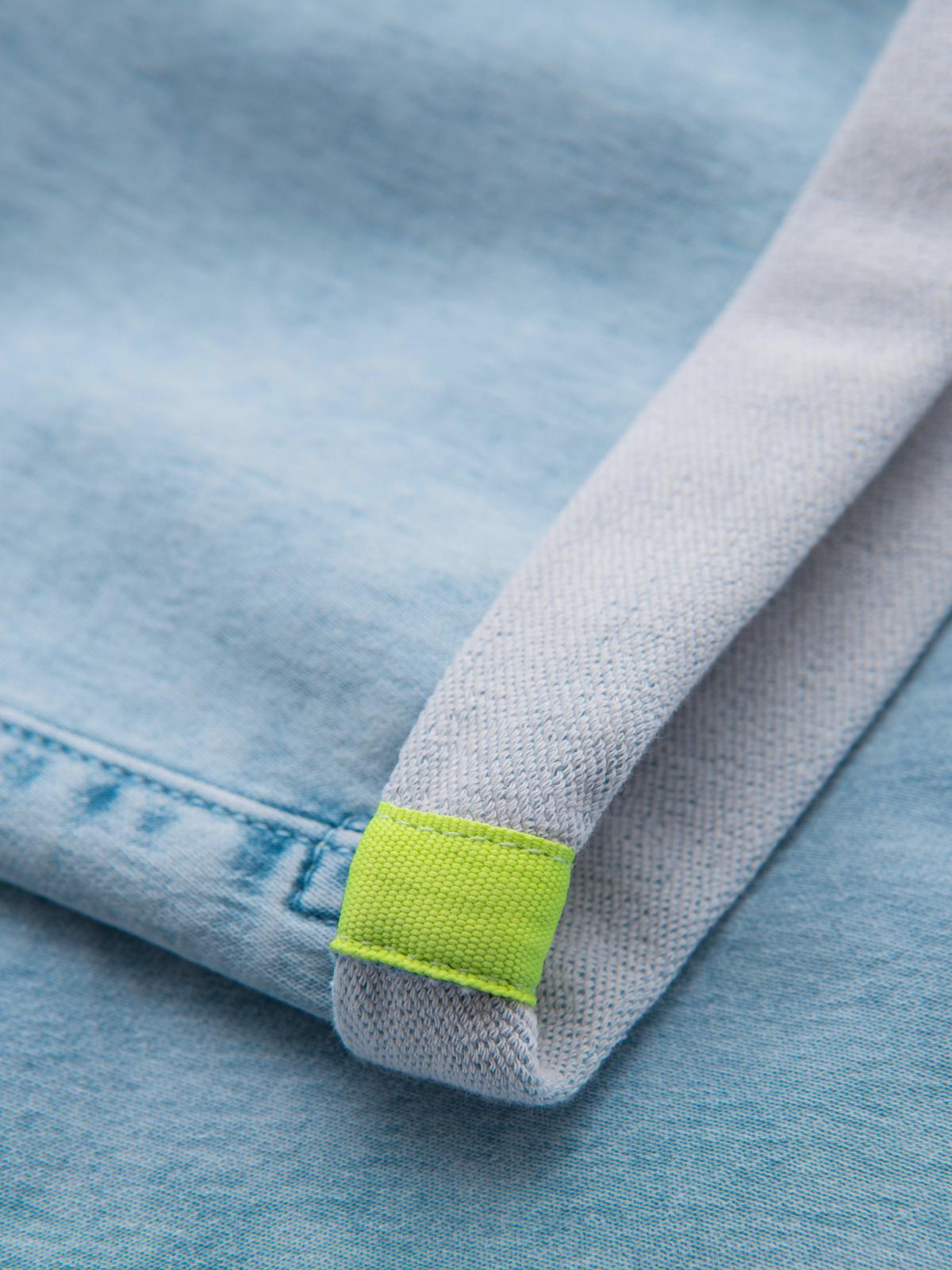 Ombre Men's short denim shorts with decorative stitching - light blue