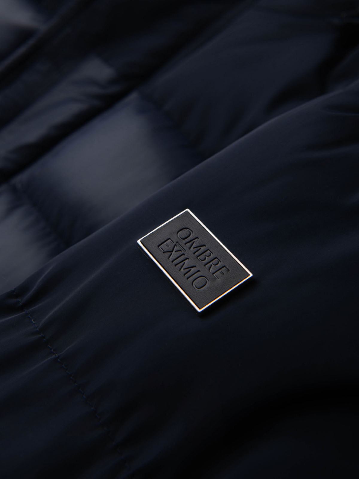 Ombre Men&#039;s quilted jacket with combined materials and hood - navy blue