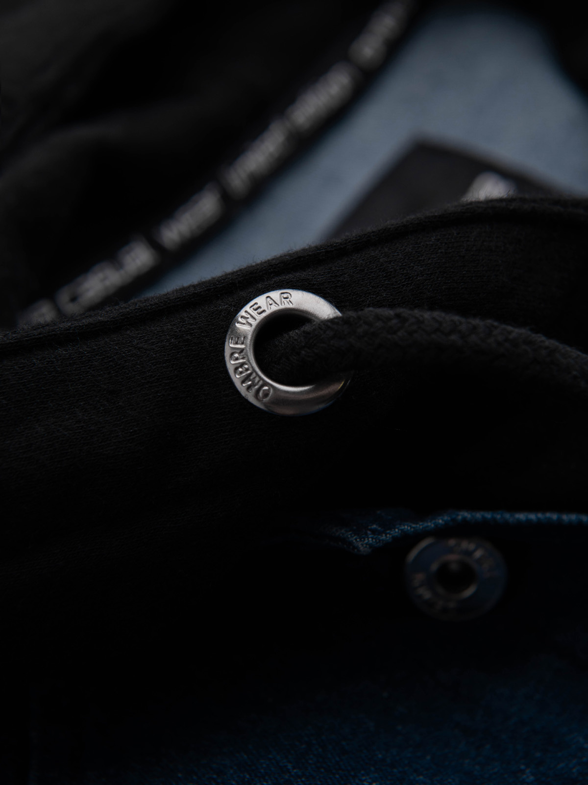 Ombre Men&#039;s denim jacket with knitted sleeves and hood - blue and black