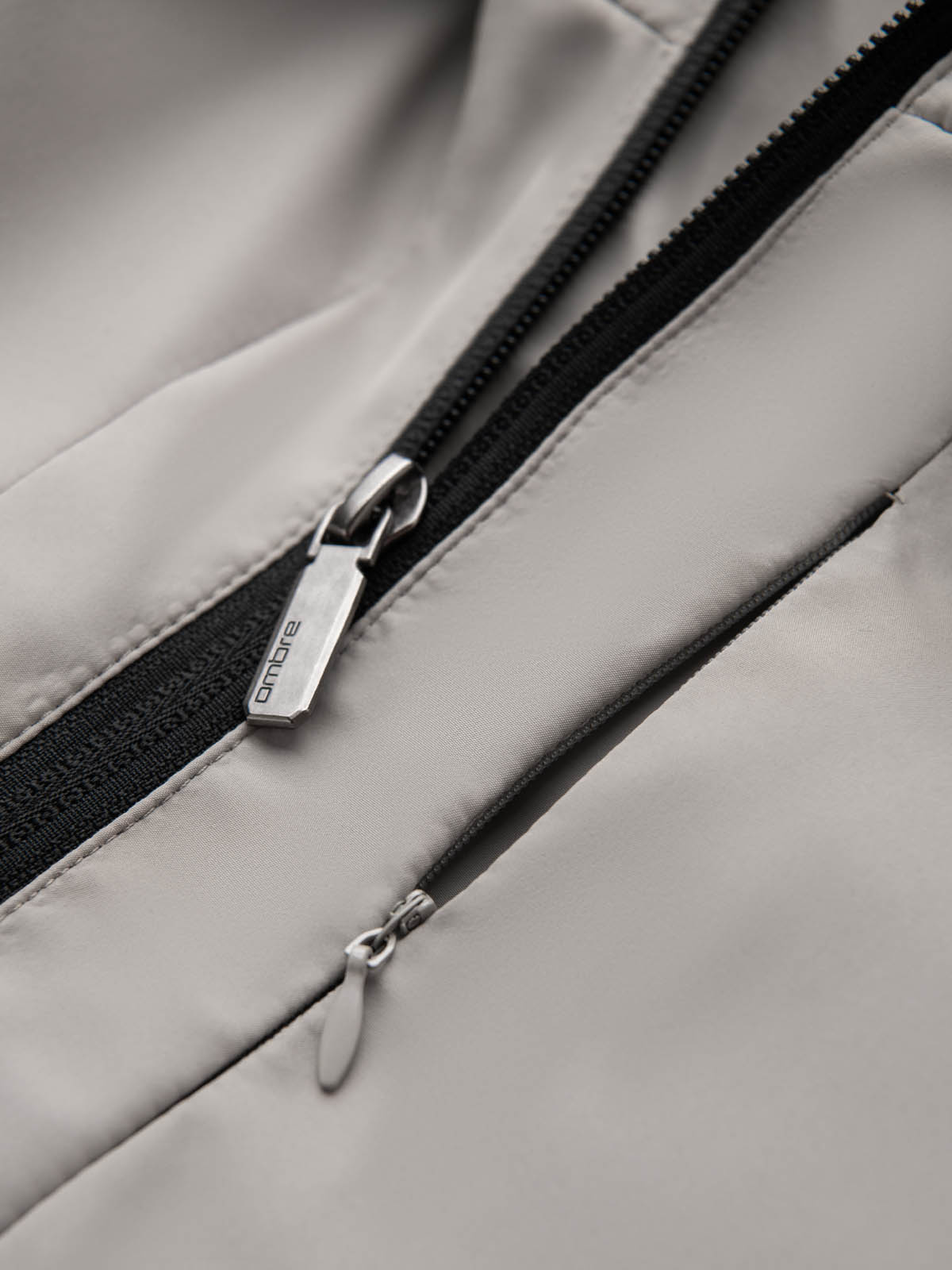 Ombre Men&#039;s lightweight jacket with mesh lining and hood - grey