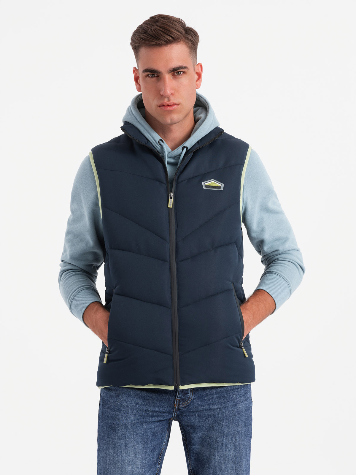 Ombre Men&#039;s quilted sleeveless jacket with neon accents - navy blue