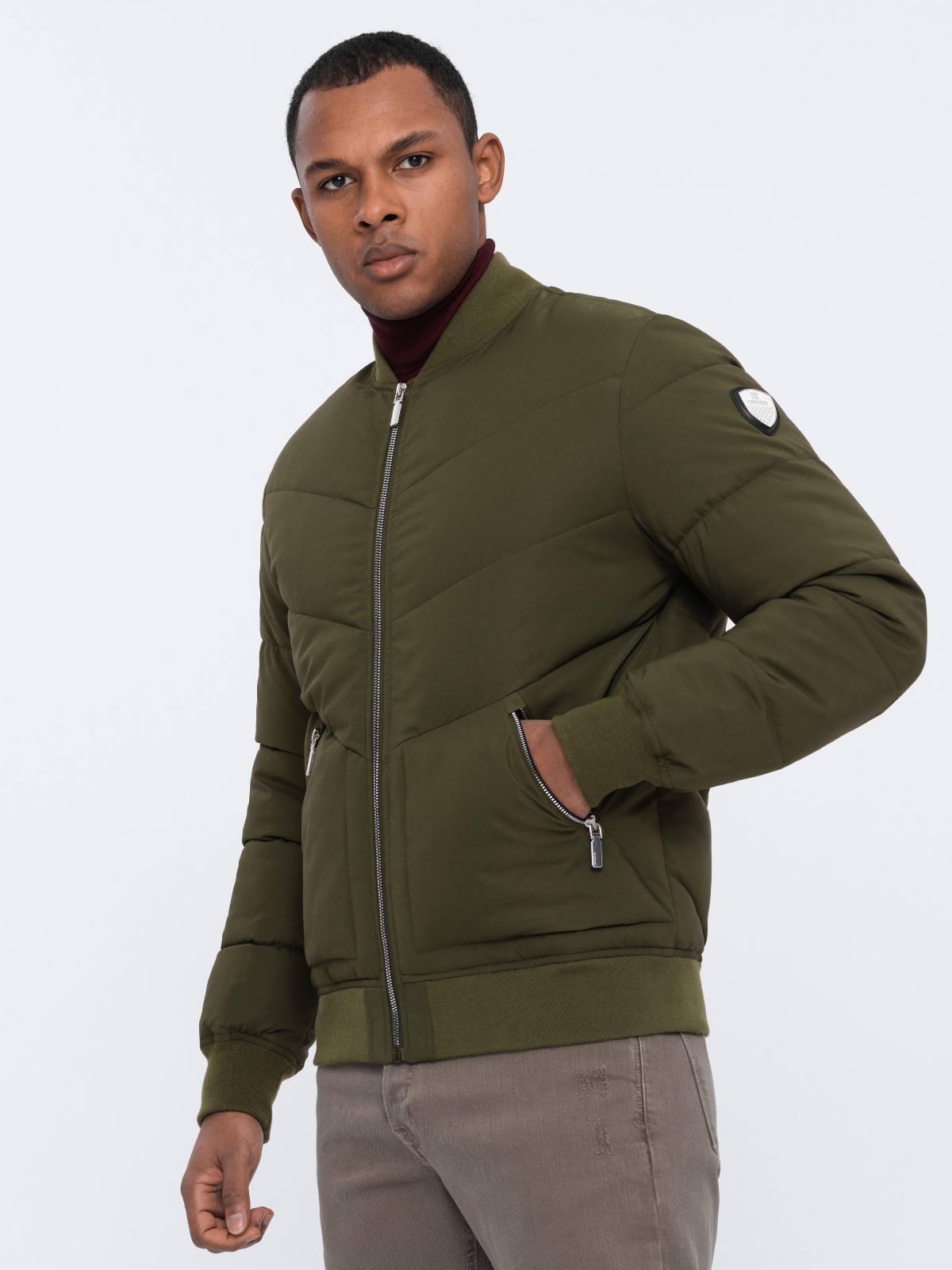 Levně Ombre Men's quilted bomber jacket with metal zippers - dark olive green